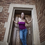Edgy fashion portrait in front of back door